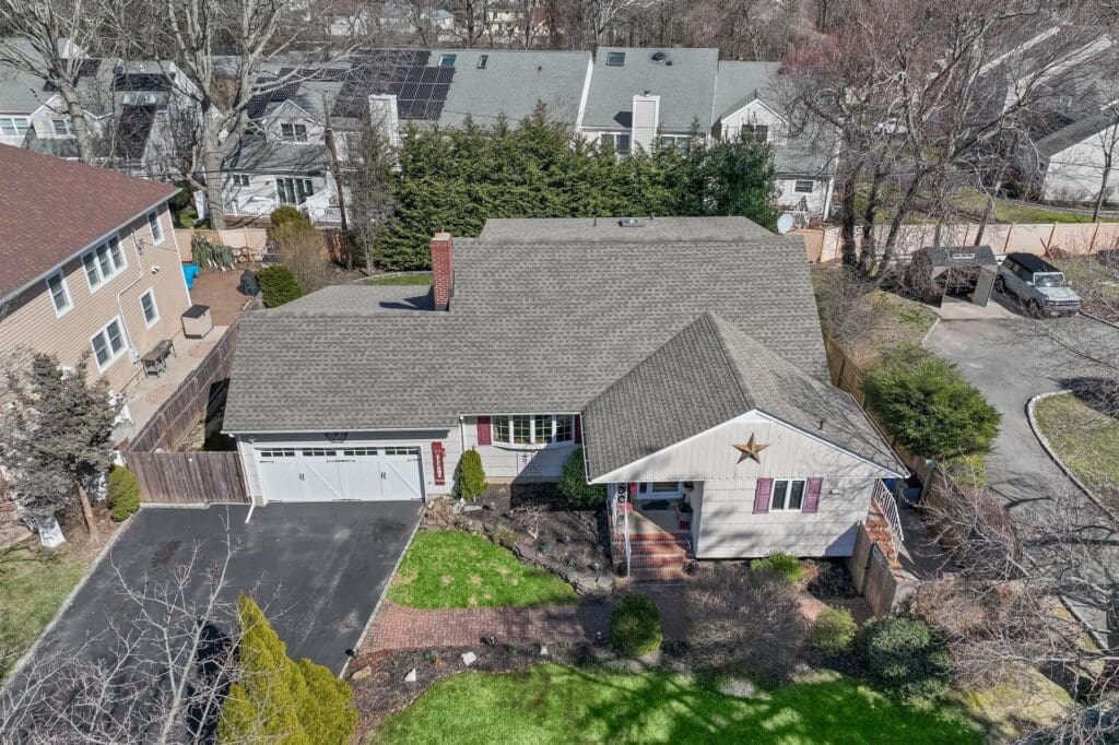Ranch house with two-car garage, aerial view